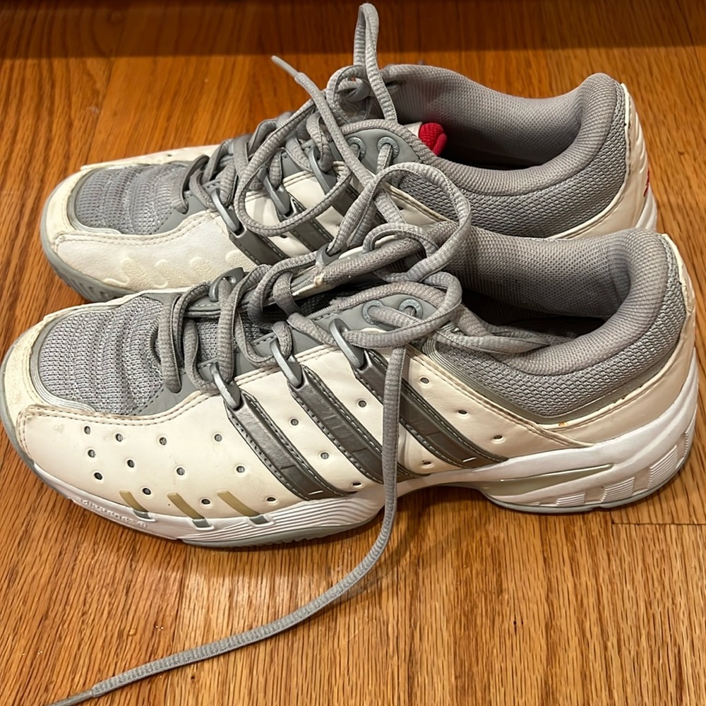 Adidas tennis court shoes.